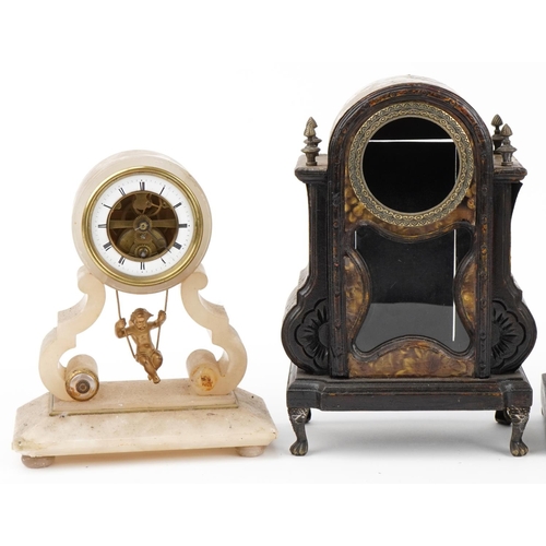 2697 - Three 19th century mantle clocks and an ornate case, the clocks comprising a gilt metal example surm... 