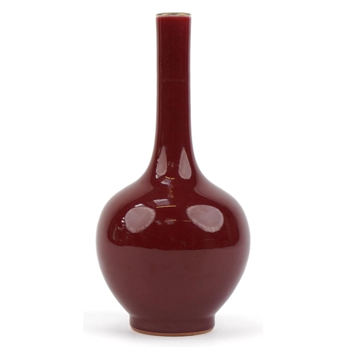 40 - Chinese porcelain long neck bottle vase having a sang de boeuf glaze, six figure character marks to ... 