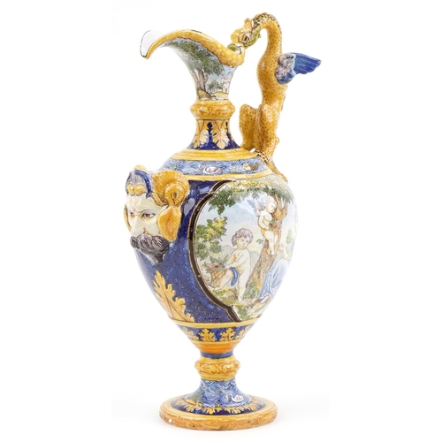 135 - Attributed to Cantagalli, Italian Maiolica ewer with mythical handle and mask, hand painted with pan... 