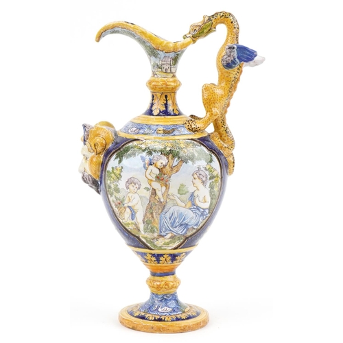 135 - Attributed to Cantagalli, Italian Maiolica ewer with mythical handle and mask, hand painted with pan... 