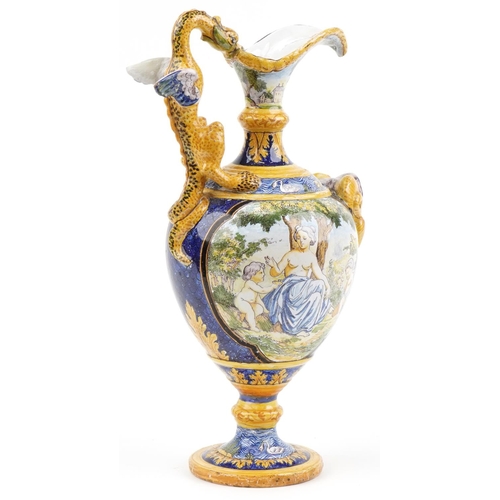 135 - Attributed to Cantagalli, Italian Maiolica ewer with mythical handle and mask, hand painted with pan... 