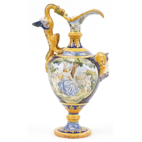 135 - Attributed to Cantagalli, Italian Maiolica ewer with mythical handle and mask, hand painted with pan... 