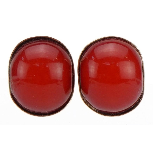 2281 - Pair of unmarked gold cabochon carnelian stud earrings, 1.6cm high, 5.6g