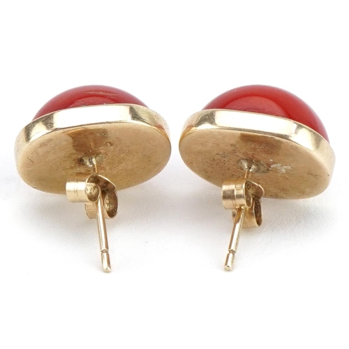 2281 - Pair of unmarked gold cabochon carnelian stud earrings, 1.6cm high, 5.6g