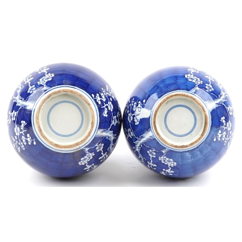 618 - Pair of Chinese blue and white porcelain double gourd vases hand painted with prunus flowers, blue r... 