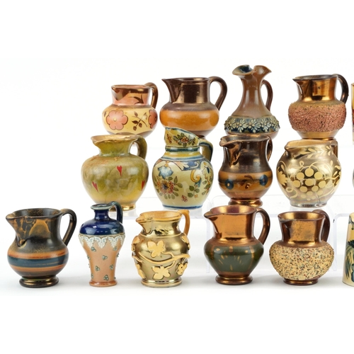 315 - 19th century and later miniature jugs, possibly some salesman samples, including floral encrusted Sp... 