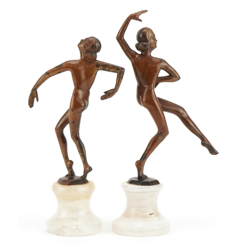 60 - Manner of Josef Lorenzl, pair of Austrian Art Deco patinated metal figures of nude females raised on... 