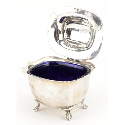 378 - Edwardian silver four footed mustard with blue glass liner, indistinct maker's mark Birmingham 1909,... 