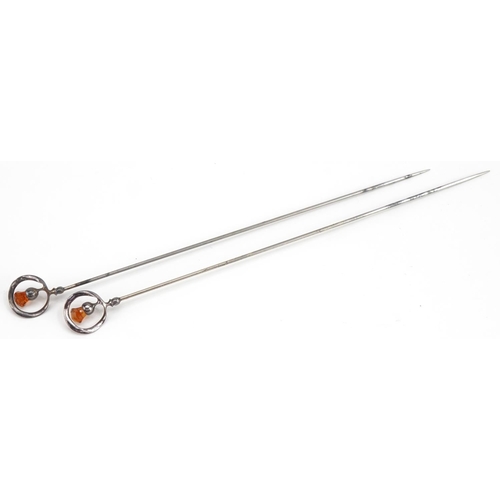 385 - Charles Horner, pair of Arts & Crafts sterling silver and citrine Scottish thistle hatpins, 17cm in ... 