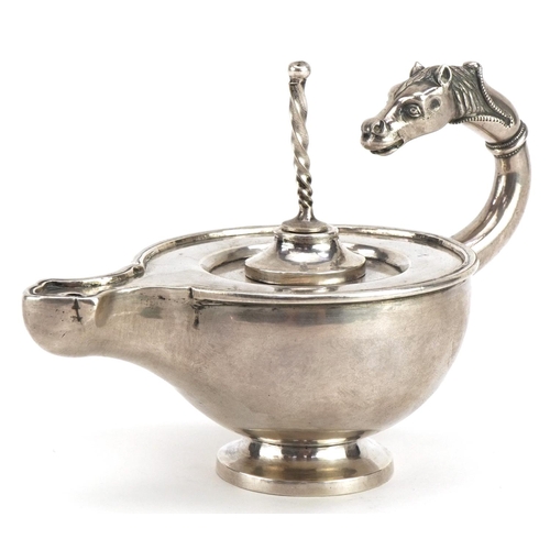 112 - Good Continental unmarked silver oil lamp with cast horse head handle, 13cm wide, 210.0g