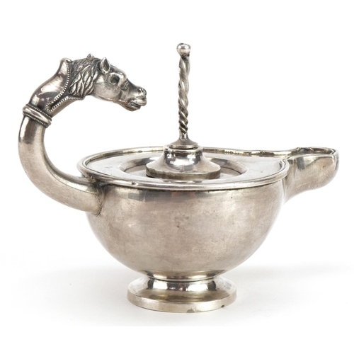 112 - Good Continental unmarked silver oil lamp with cast horse head handle, 13cm wide, 210.0g