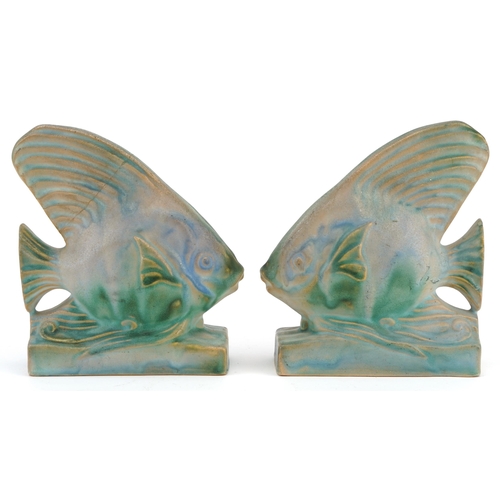 264 - Pair of Bourne Denby Danesby Ware bookends in the form of stylised fish, each 16.5cm high