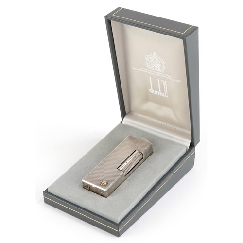 342 - Dunhill silver plated pocket lighter with engine turned case and boxes