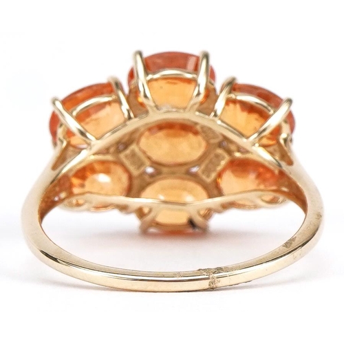 2264 - 9ct gold citrine and diamond cluster ring, each citrine approximately 6.9mm x 4.9mm, size T, 4.3g