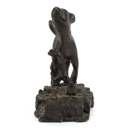 160 - Antique patinated bronze dog on later base, possibly Roman, 5.5cm in length