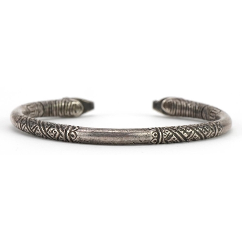 284 - Antique North Indian or Himalayan unmarked silver Makara head bangle, 7.5cm wide, 41.5g