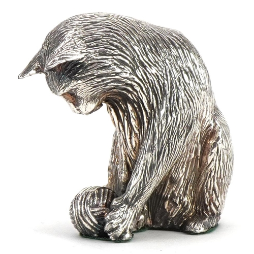 616 - Elizabeth II silver filled study of a cat with a ball of yarn, 5.5cm high, 78.5g