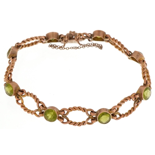 2021 - 9ct gold green stone rope twist bracelet with safety chain, possibly green amethyst, 13.6g