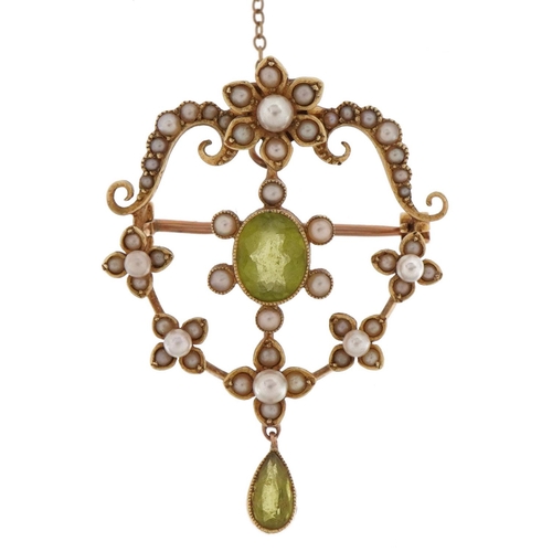 2022 - Edwardian 15ct gold peridot and seed pearl floral openwork drop pendant brooch with safety chain, 3.... 