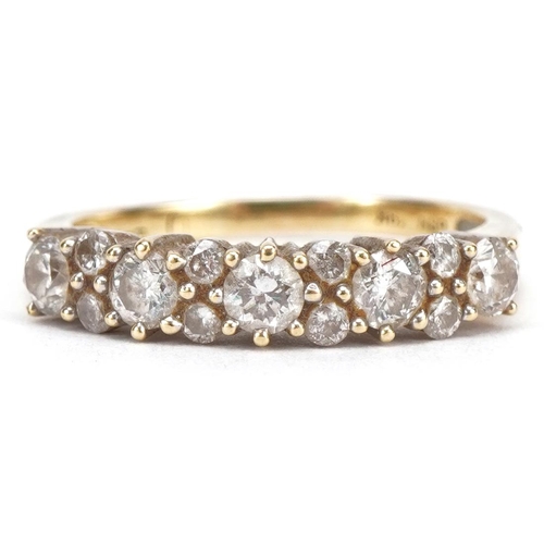 2249 - 18ct gold diamond ring set with thirteen diamonds, the largest each approximately 3.3mm in diameter,... 