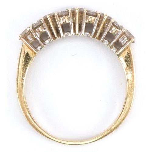 2249 - 18ct gold diamond ring set with thirteen diamonds, the largest each approximately 3.3mm in diameter,... 