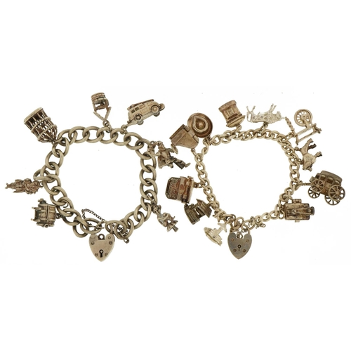 2266 - Two silver charm bracelets with love heart padlocks and a selection of mostly silver charms includin... 