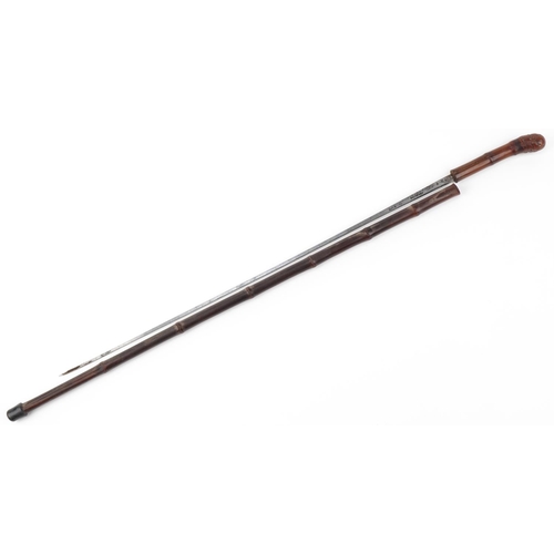 604 - Bamboo walking swordstick with steel blade, impressed Solingen, 89cm in length