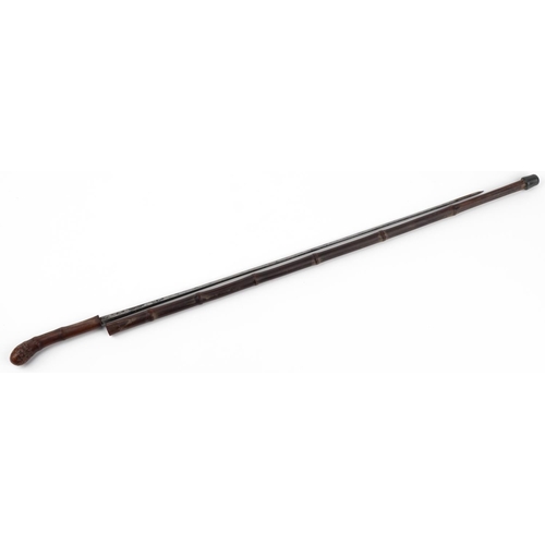 604 - Bamboo walking swordstick with steel blade, impressed Solingen, 89cm in length