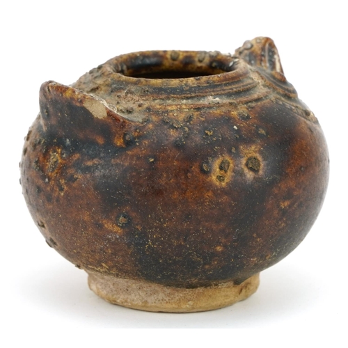 354 - Chinese stoneware jar in the form of a bird having a brown glaze, 8cm in length