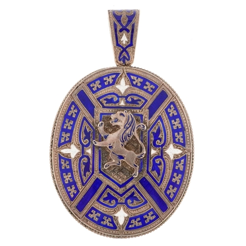 2025 - Edwardian unmarked silver blue and white enamel pendant locket with applied rampant lion and Edwardi... 