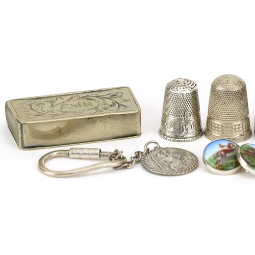 648 - Silver objects and jewellery including thimbles, St Christopher keyring, horseracing interest cuffli... 