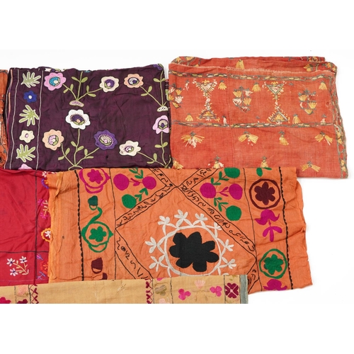 308 - Collection of Indian and Afghan textiles predominantly embroidered with flowers