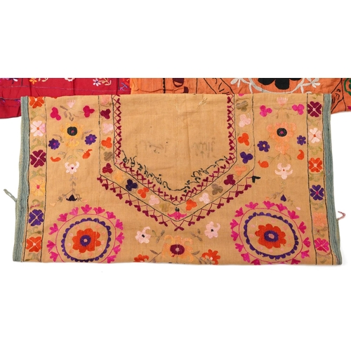 308 - Collection of Indian and Afghan textiles predominantly embroidered with flowers