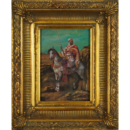 593 - Warrior on horseback, Orientalist oil on board, indistinctly signed, possibly I Alte...?, housed in ... 