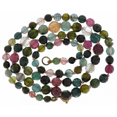 2269 - Single strand graduated bead necklace set with various stones including tourmaline and rose quartz, ... 