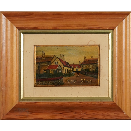 3012 - Village street scene inscribed A Merry Xmas, early 20th century oil on convex wood panel, mounted an... 