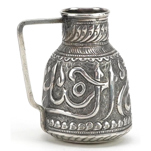 17 - Islamic unmarked silver handled vessel embossed with calligraphy, 6cm high, 30.0g