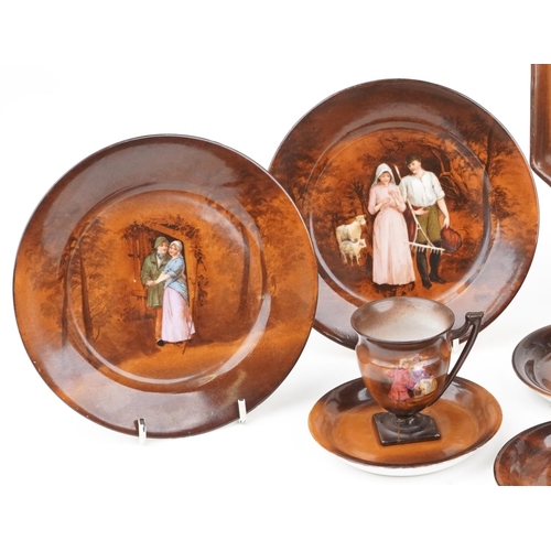 26 - German Sylvia porcelain teaware including various plates and cups decorated with figures, the larges... 