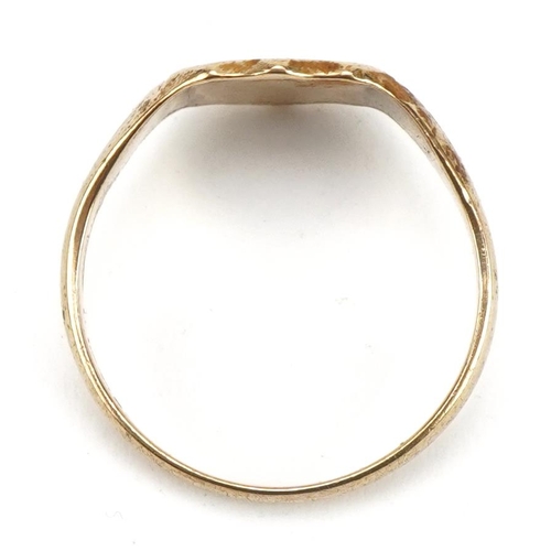 57 - 9ct gold shield shaped signet ring, size X, 4.2g