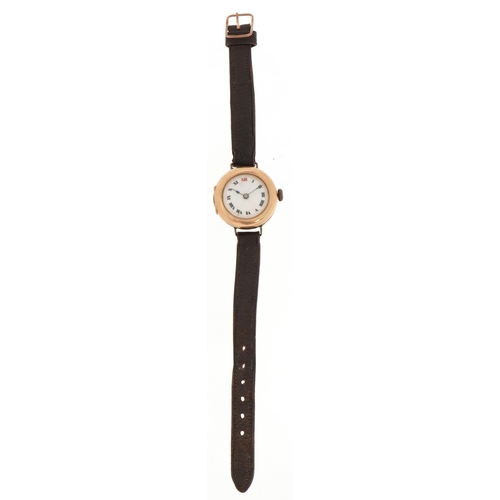 58 - 9ct gold wristwatch with enamelled dial and leather strap, 26mm in diameter, total weight 18.0g