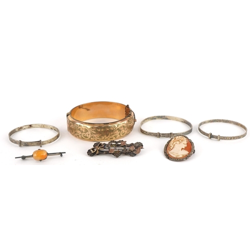 67 - Antique and later jewellery including three silver christening bracelets, 9ct gold metal core hinged... 