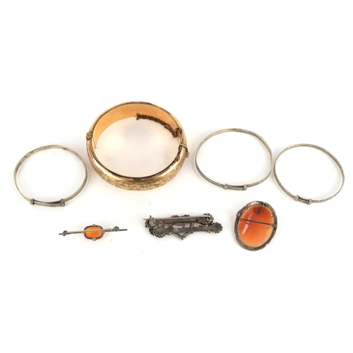 67 - Antique and later jewellery including three silver christening bracelets, 9ct gold metal core hinged... 