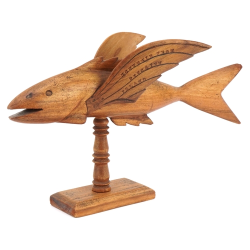 77 - Pitcairn Island carved souvenir treen flying fish made by Lancy Christian, 34.5cm in length