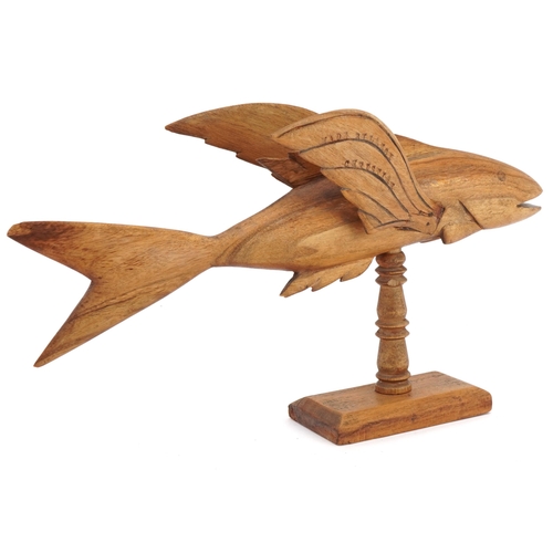 77 - Pitcairn Island carved souvenir treen flying fish made by Lancy Christian, 34.5cm in length