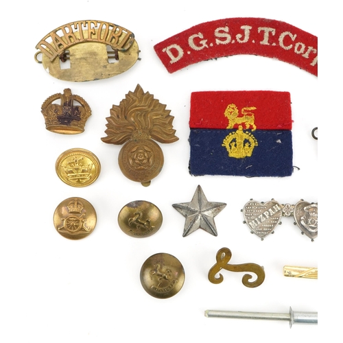 79 - Militaria including silver Royal Artillery mizpah double love heart brooch, cap badge, buttons and D... 