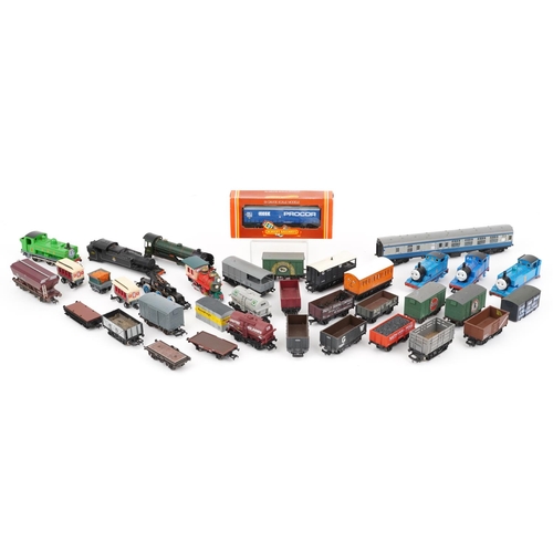 103 - Collection of OO gauge model railway locomotives, wagons and tankers including Hornby Thomas the Tan... 