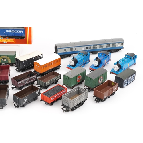 103 - Collection of OO gauge model railway locomotives, wagons and tankers including Hornby Thomas the Tan... 