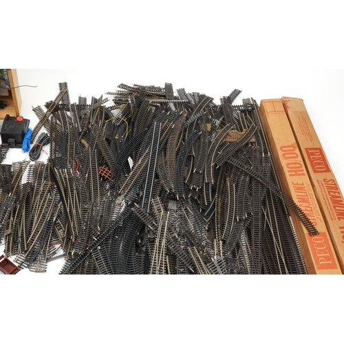 107 - Extensive collection of model railway accessories, predominantly OO gauge, including railway track, ... 