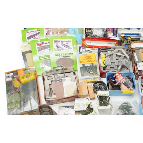 107 - Extensive collection of model railway accessories, predominantly OO gauge, including railway track, ... 