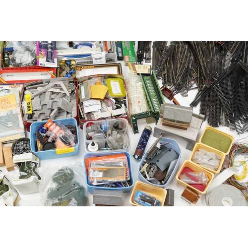 107 - Extensive collection of model railway accessories, predominantly OO gauge, including railway track, ... 